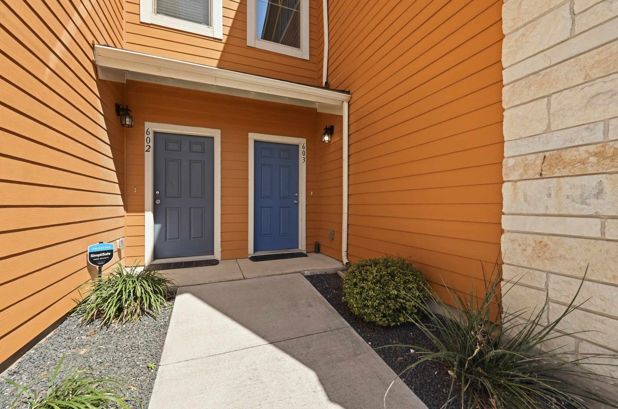 516 East Slaughter Lane, Unit 603 Austin, TX 78744 - Photo 2 of 26 a view of backyard with pathway