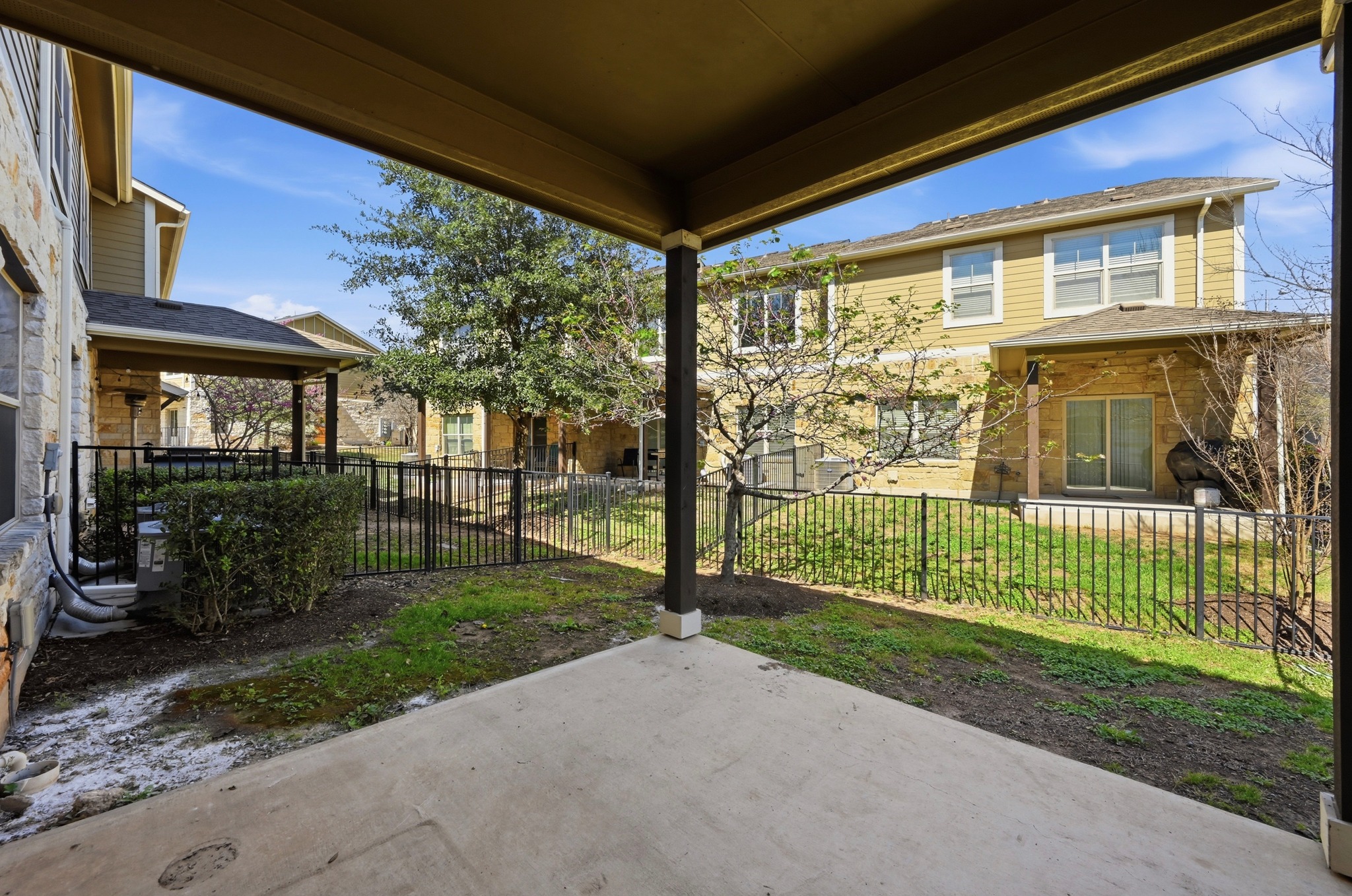 516 East Slaughter Lane, Unit 603 Austin, TX 78744 - Photo 22 of 26 a view of a house with a yard