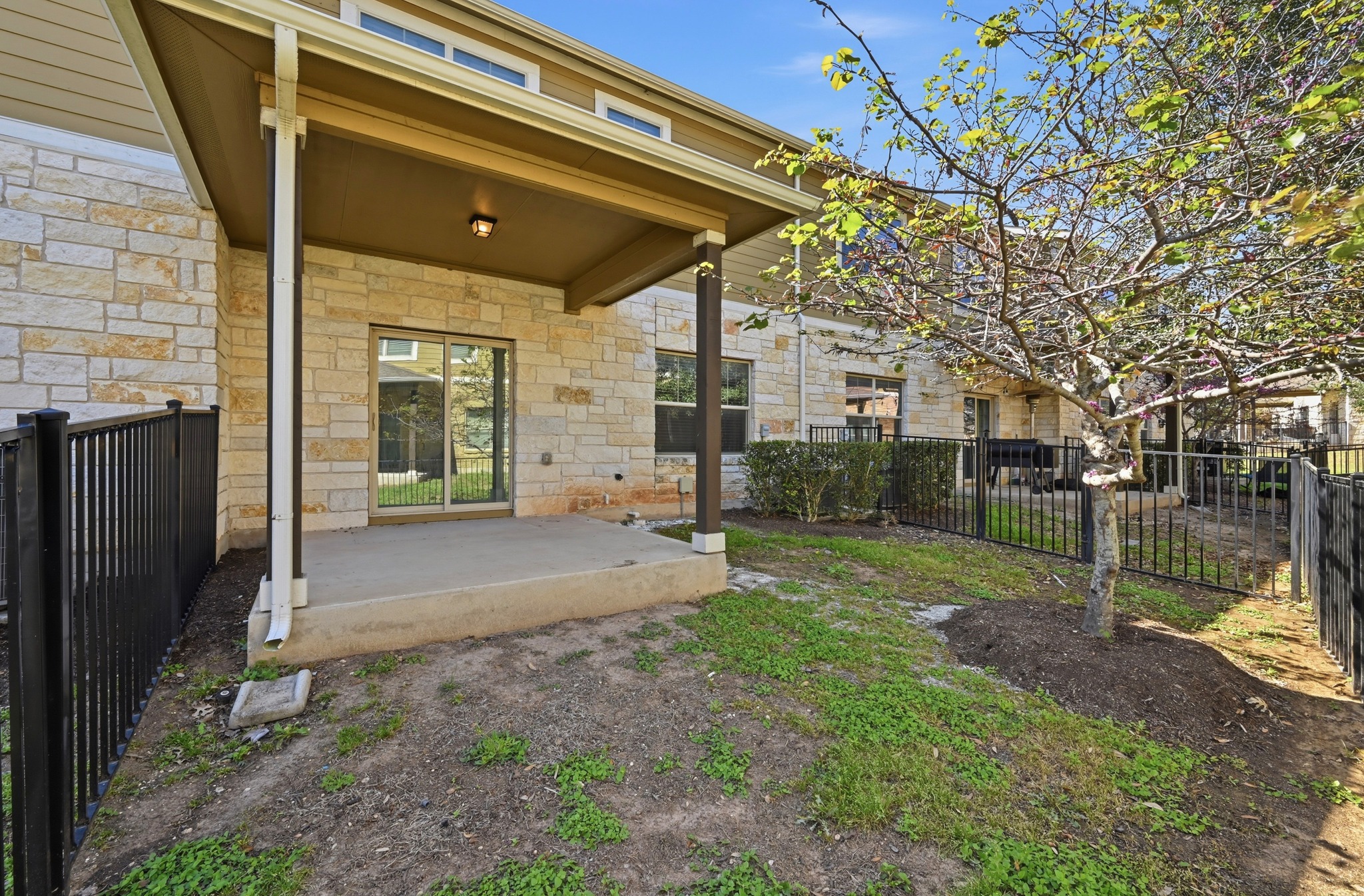 516 East Slaughter Lane, Unit 603 Austin, TX 78744 - Photo 23 of 26 a view of a porch with a backyard