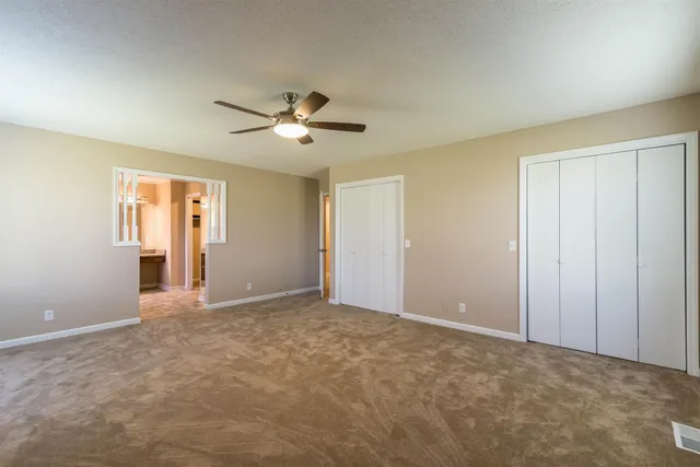 a kitchen with stainless steel appliances granite countertop a refrigerator stove and oven