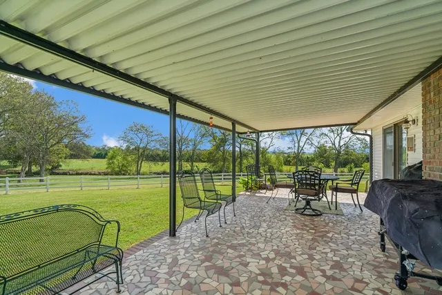 a kitchen that has a sink and a stove in it