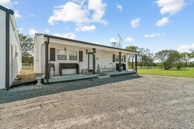 a kitchen with cabinets stainless steel appliances and a counter space