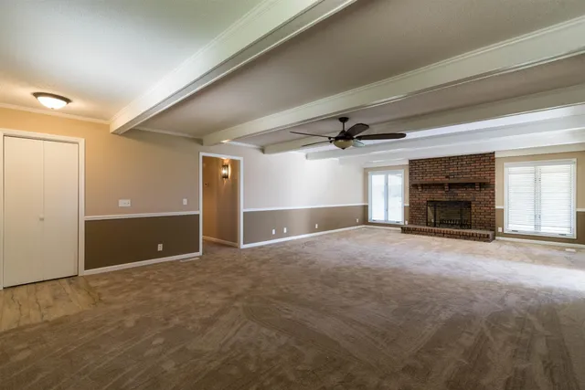 a bathroom with a granite countertop sink mirror and double