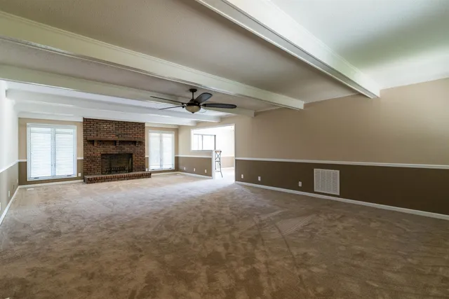 a view of closet area with empty racks