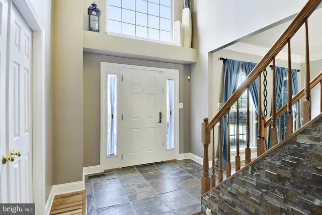 a view of an entryway with staircase