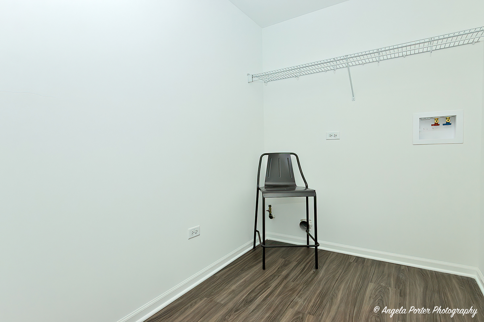 402 Neubauer Circle Lindenhurst, IL 60046 - Photo 28 of 29 a view of an empty room with wooden floor and a window