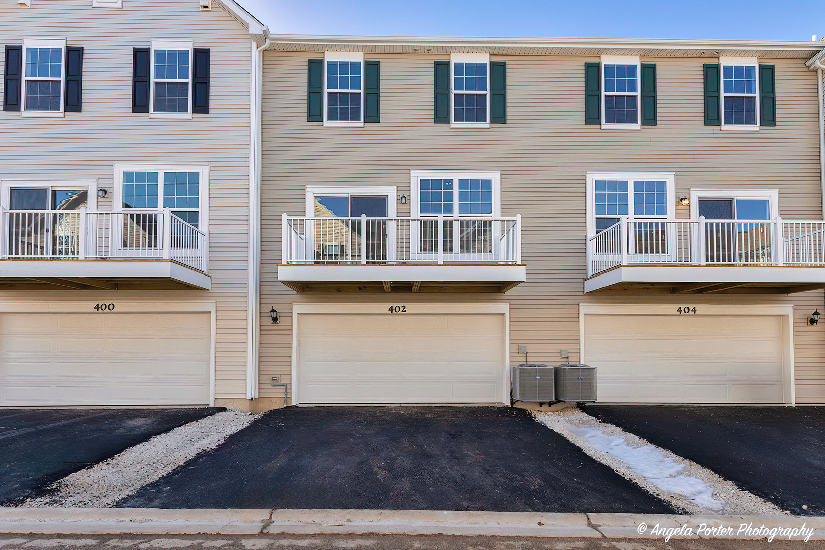 402 Neubauer Circle Lindenhurst, IL 60046 - Photo 29 of 29 a front view of a building with many windows