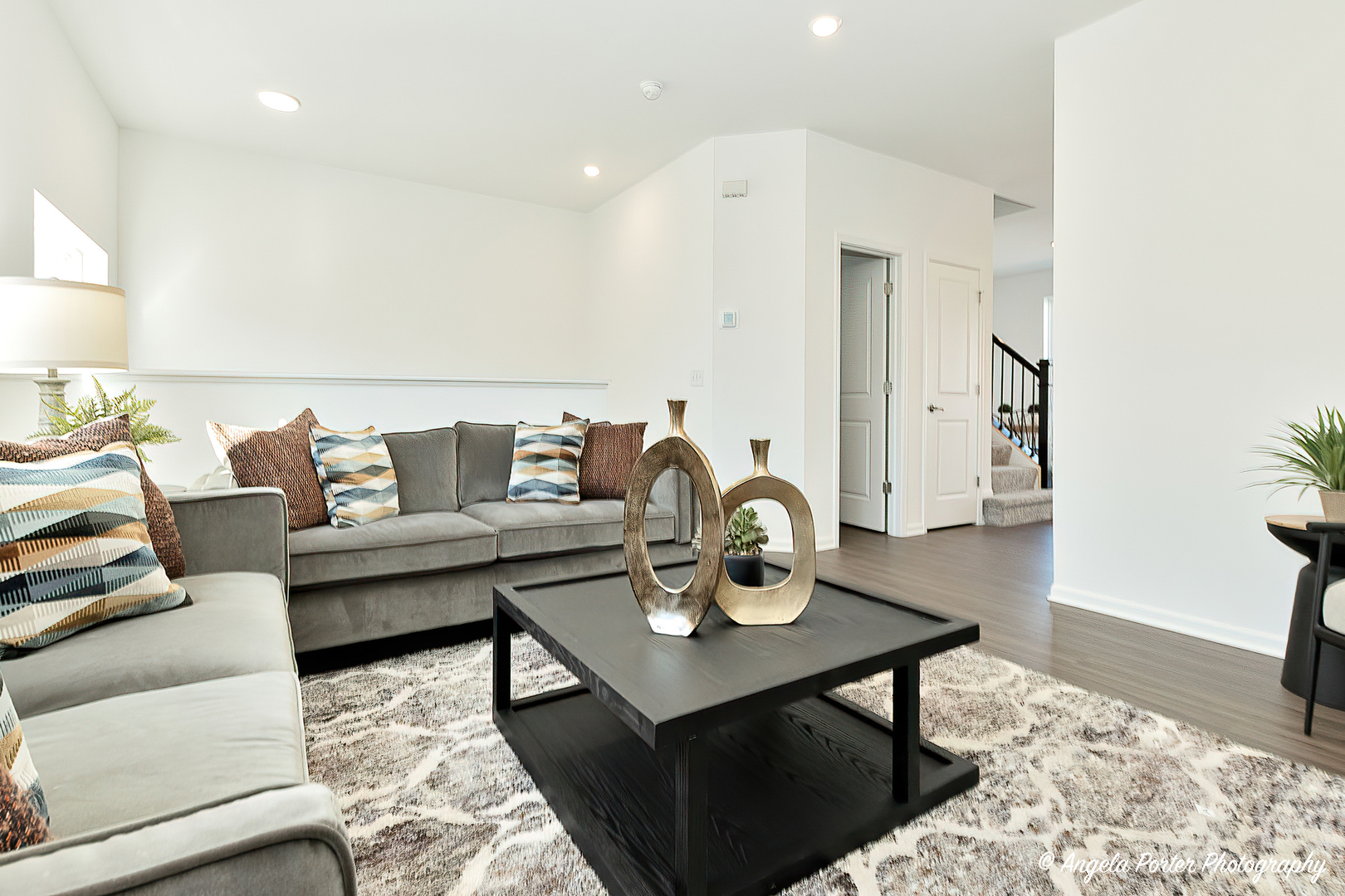 402 Neubauer Circle Lindenhurst, IL 60046 - Photo 6 of 29 a living room with furniture and wooden floor