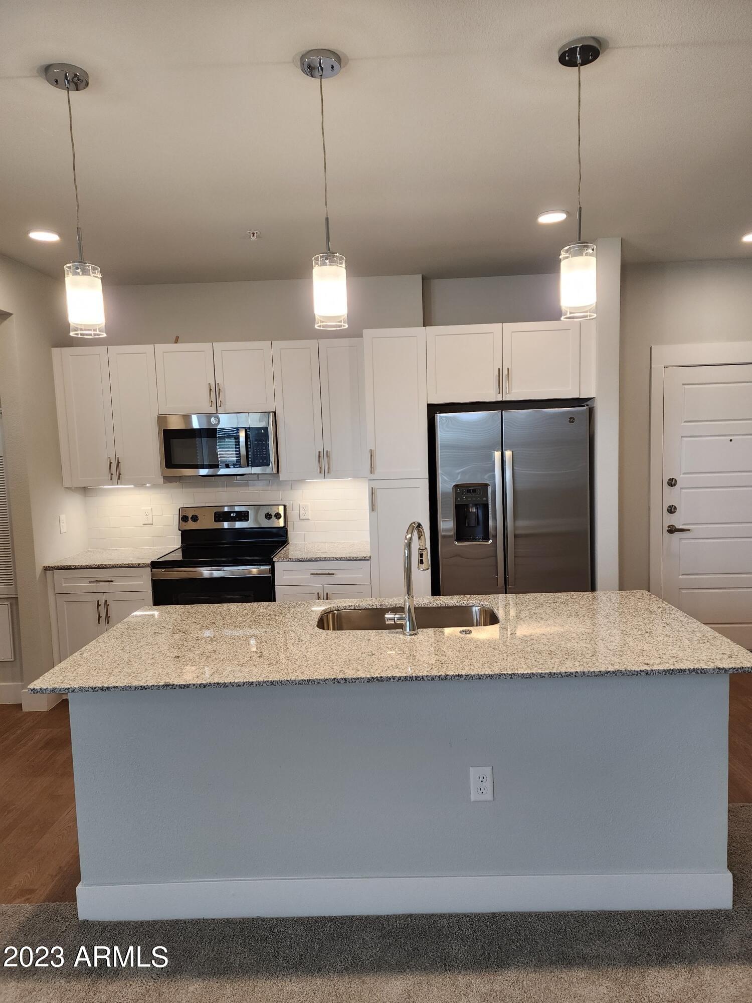 10529 East Hampton Avenue, Unit B3 Mesa, AZ 85209 - Photo 2 of 25 Kitchen