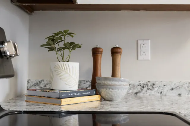 a vase of flowers sitting on a table