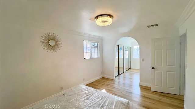 a view of livingroom with hardwood floor and hallway