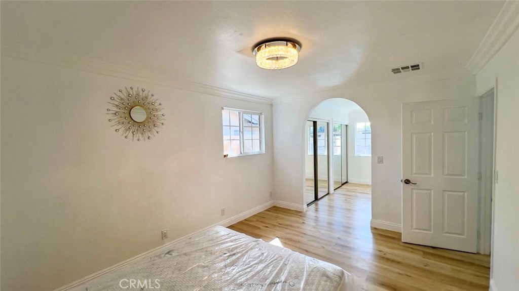 900 South Hayward Street Anaheim, CA 92804 - Photo 17 of 38 a view of livingroom with hardwood floor and hallway