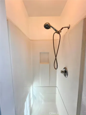 a view of a bathroom from the hallway