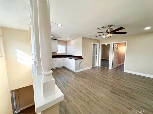 a large kitchen with stainless steel appliances granite countertop a large counter top and sink