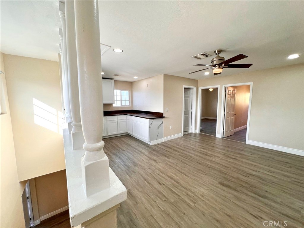 900 South Hayward Street Anaheim, CA 92804 - Photo 29 of 38 a view of a kitchen with a sink and a refrigerator