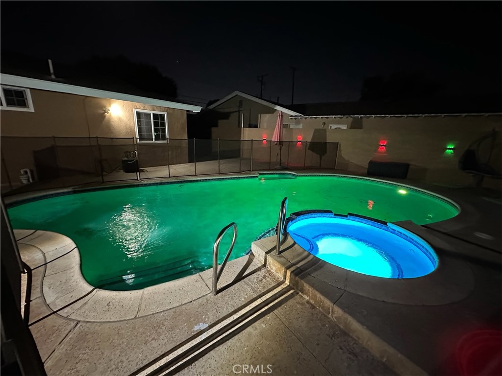 900 South Hayward Street Anaheim, CA 92804 - Photo 38 of 38 a swimming pool with outdoor seating and yard