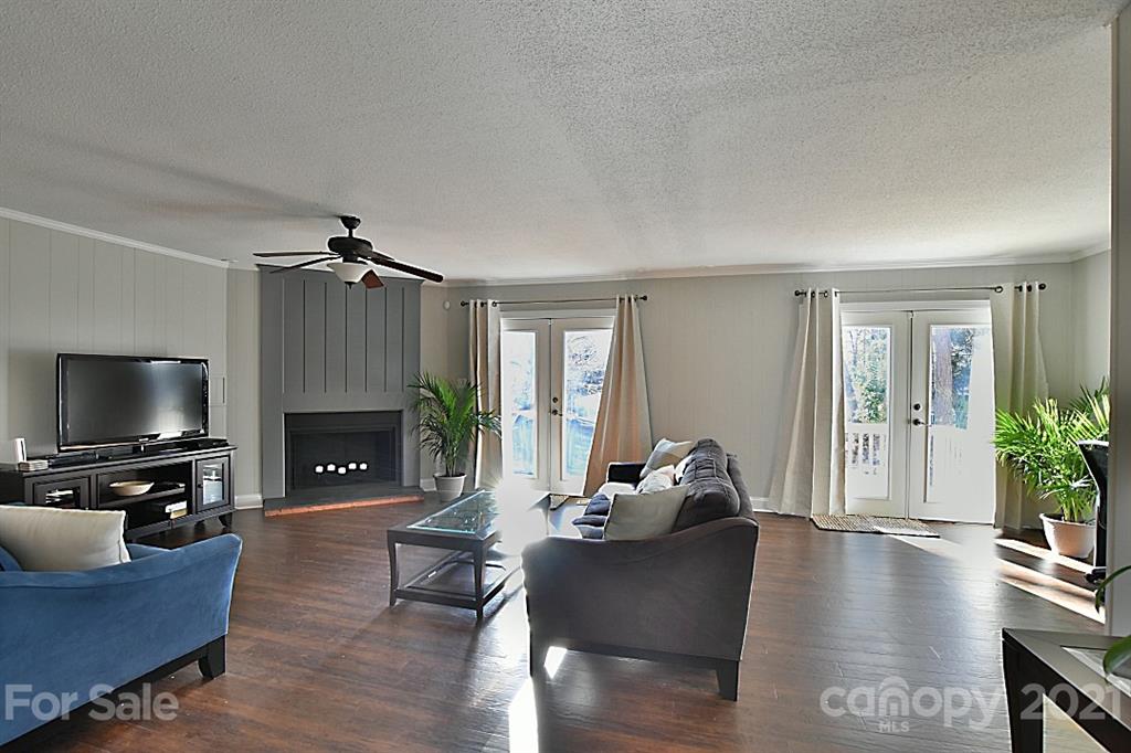 4078 Point Clear Drive Tega Cay, SC 29708 - Photo 5 of 28 a living room with furniture or fireplace and a flat screen tv