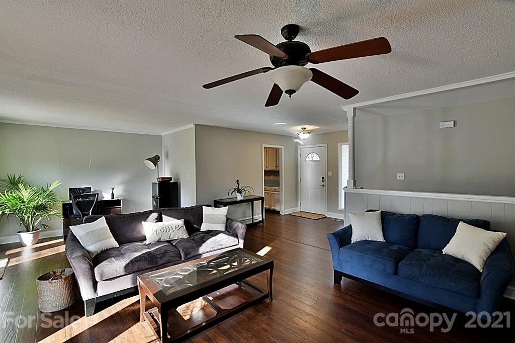 4078 Point Clear Drive Tega Cay, SC 29708 - Photo 7 of 28 a living room with furniture and a ceiling fan