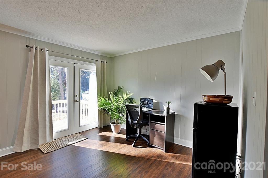 4078 Point Clear Drive Tega Cay, SC 29708 - Photo 8 of 28 a view of a workspace with furniture and a window