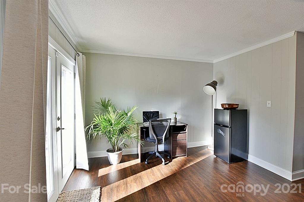4078 Point Clear Drive Tega Cay, SC 29708 - Photo 9 of 28 a hallway with wooden floor and a potted plant