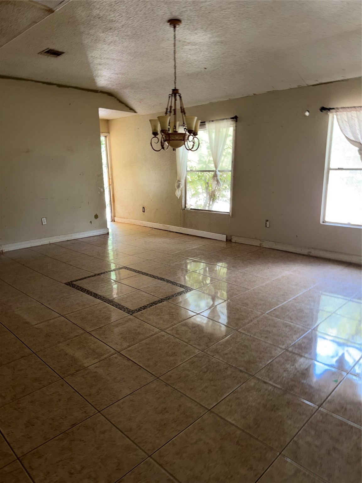 735 Pecan Street Fresno, TX 77545 - Photo 5 of 7 a view of a livingroom with a window and wooden floor