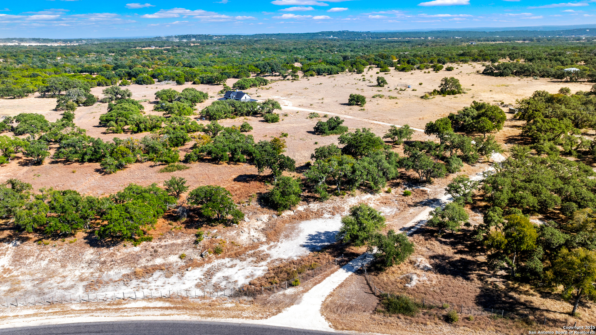235 Sattler Road Spring Branch, TX 78070 - Photo 12 of 43 a view of a lake with mountains in the background