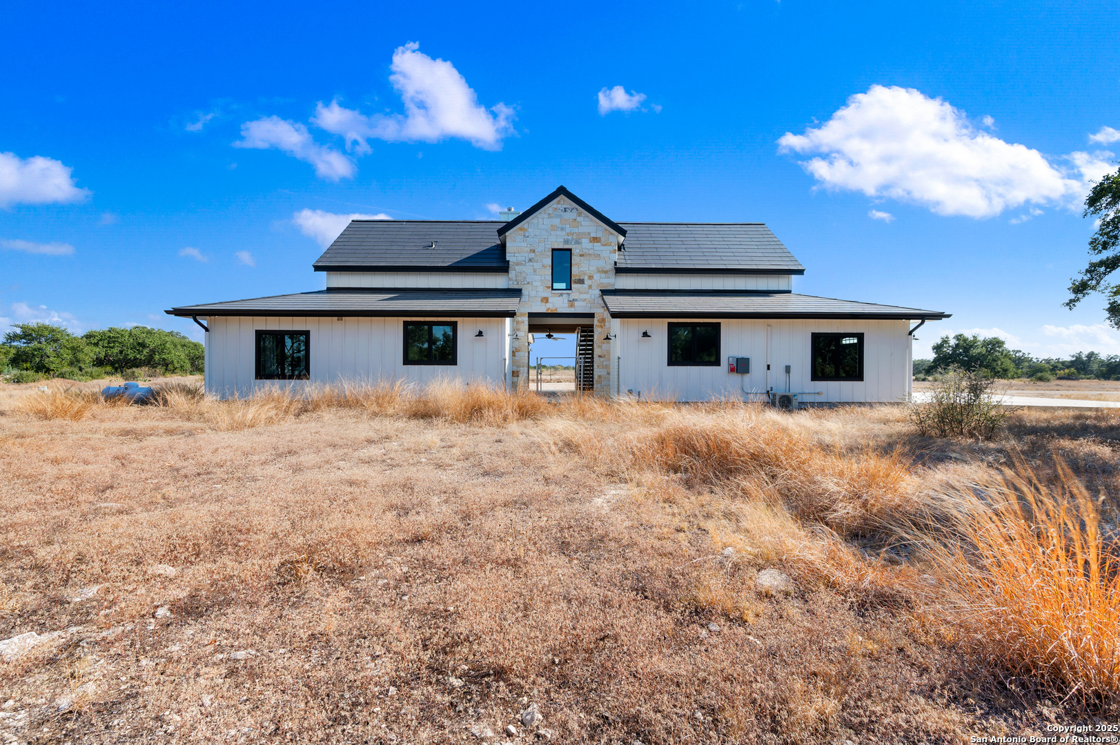 235 Sattler Road Spring Branch, TX 78070 - Photo 2 of 43 front view of a house with a yard