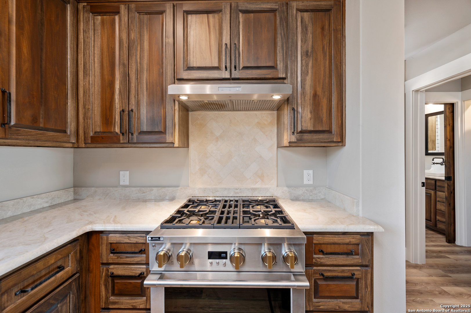 235 Sattler Road Spring Branch, TX 78070 - Photo 31 of 43 a stove top oven sitting inside of a kitchen