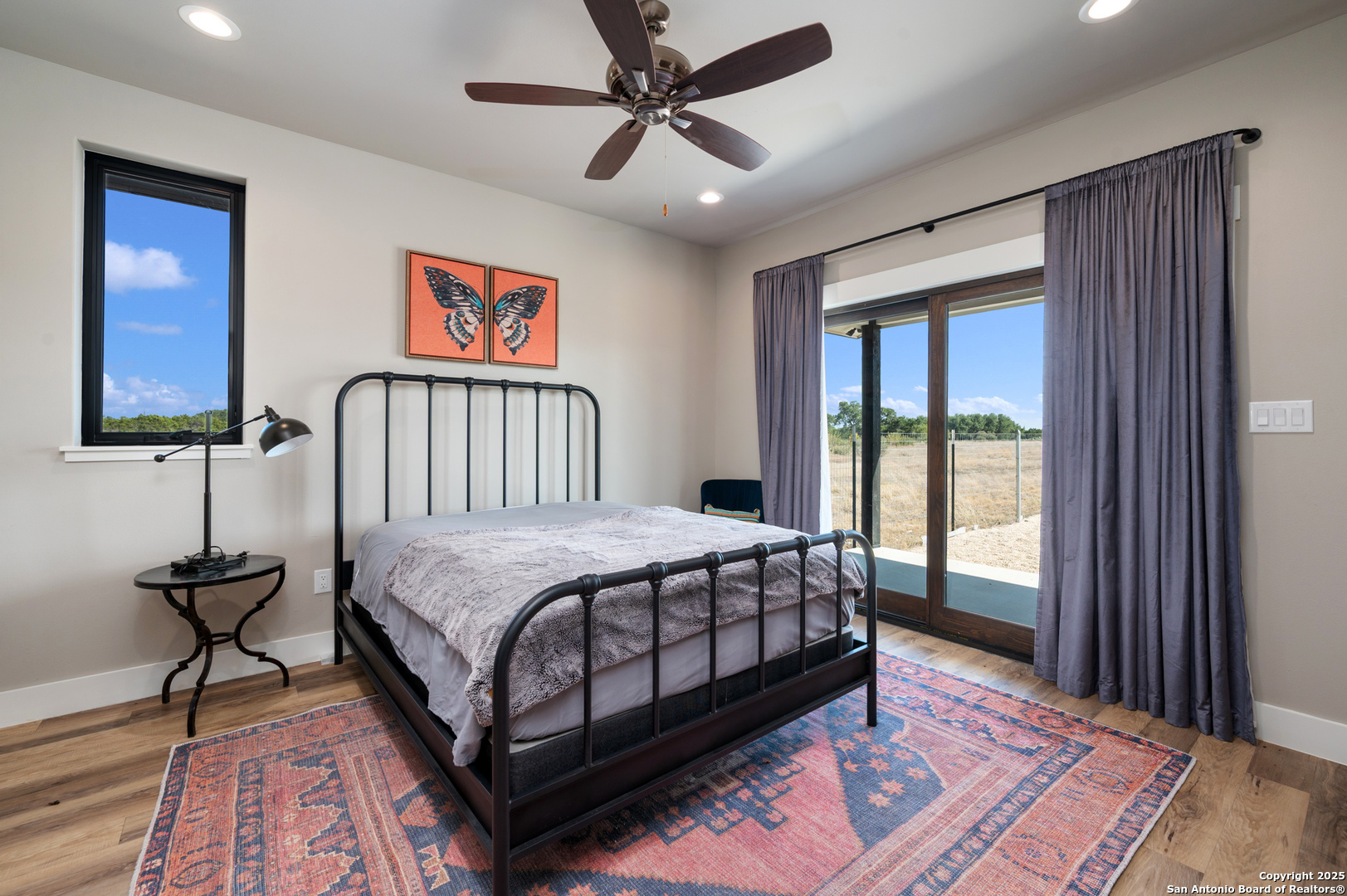 235 Sattler Road Spring Branch, TX 78070 - Photo 33 of 43 a bedroom with a bed and a window