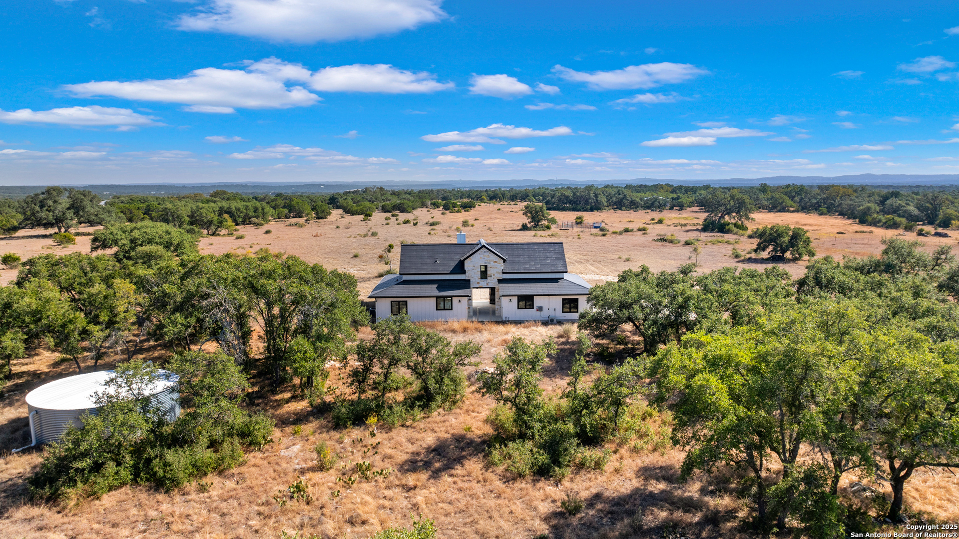 235 Sattler Road Spring Branch, TX 78070 - Photo 5 of 43 a view of a lake with a city