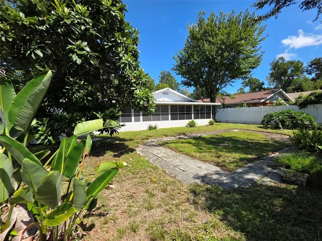 a view of a house with a big yard
