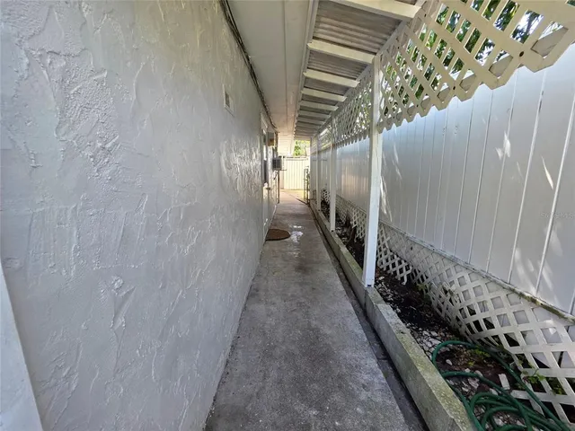 a hallway with wooden floor
