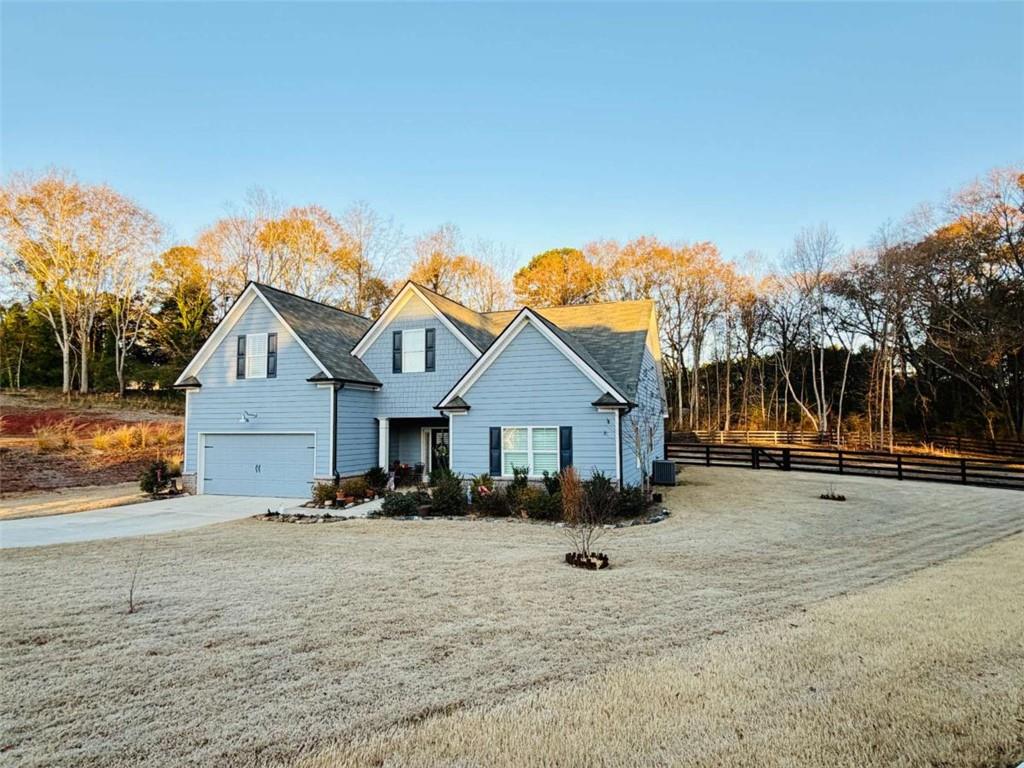 386 Westminster Trail Winder, GA 30680 - Photo 3 of 20 a view of a house with a yard