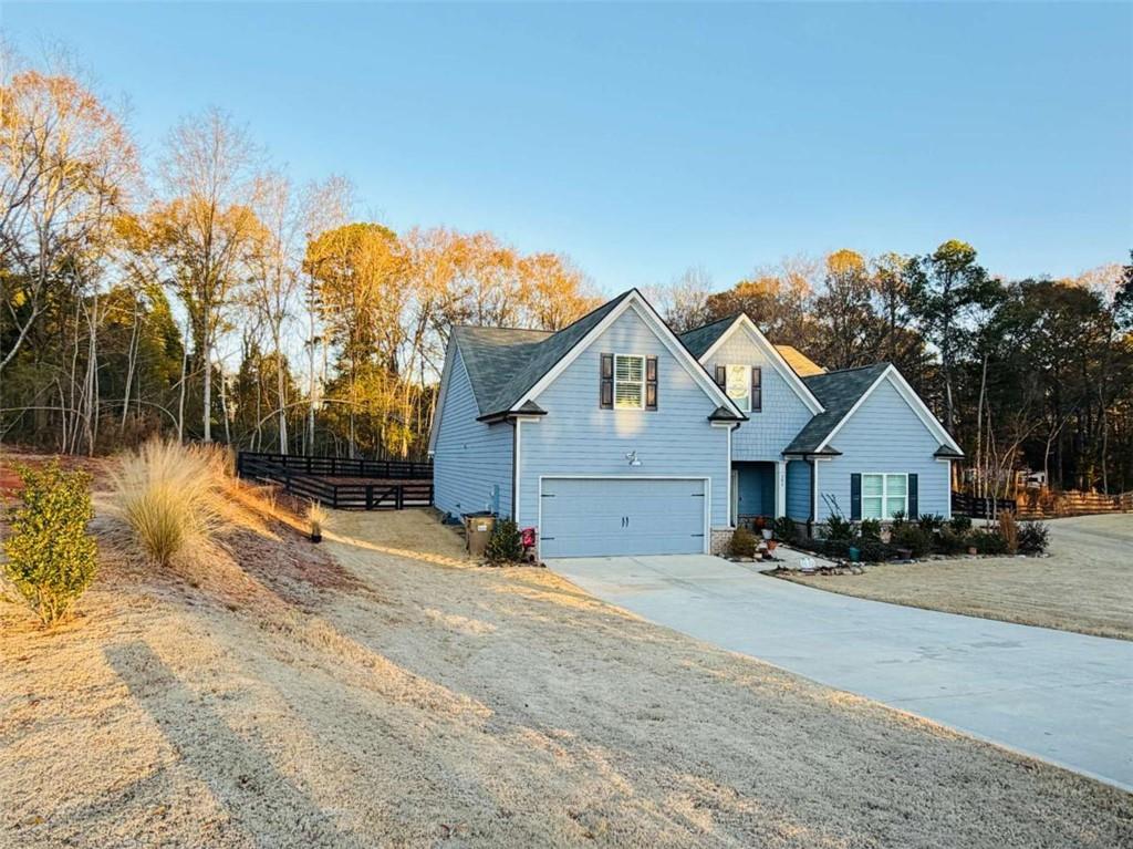 386 Westminster Trail Winder, GA 30680 - Photo 4 of 20 a view of a house with a yard