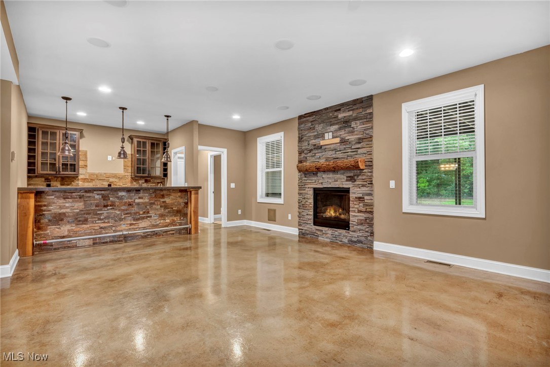 1029 North Quarry Road Amherst, OH 44001 - Photo 31 of 49 Recreation Room bar and fireplace