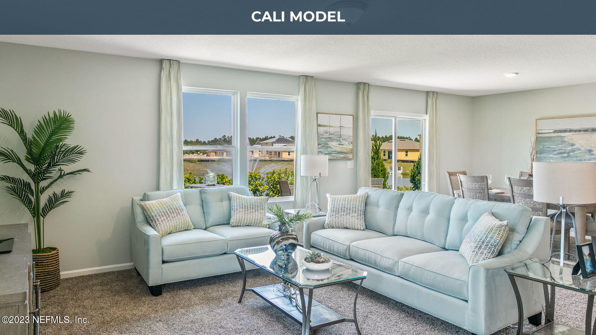 12583 Russian Olive Road Jacksonville, FL 32218 - Photo 12 of 32 a living room with furniture and a large window