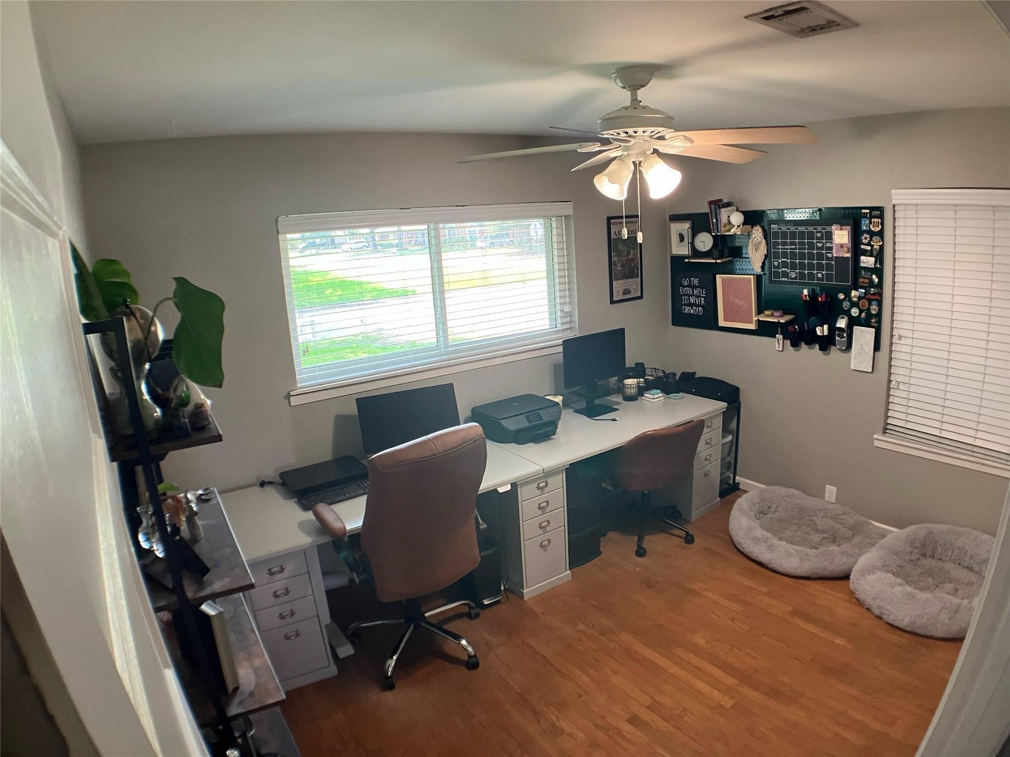 3027 Guese Road Houston, TX 77018 - Photo 14 of 22 Bright secondary room with large windows makes an ideal office, study, or guest bedroom.