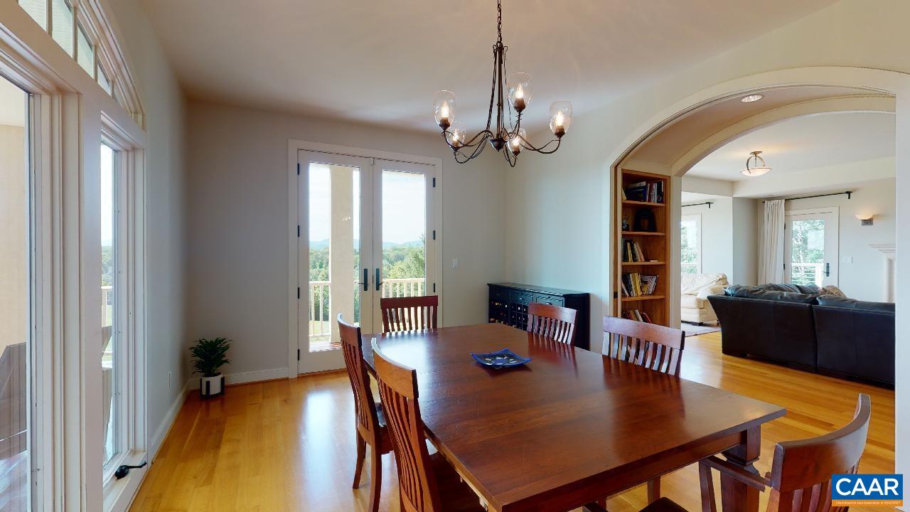 1812 Frays Mill Road Ruckersville, VA 22968 - Photo 14 of 74 a view of a dining room with furniture and wooden floor