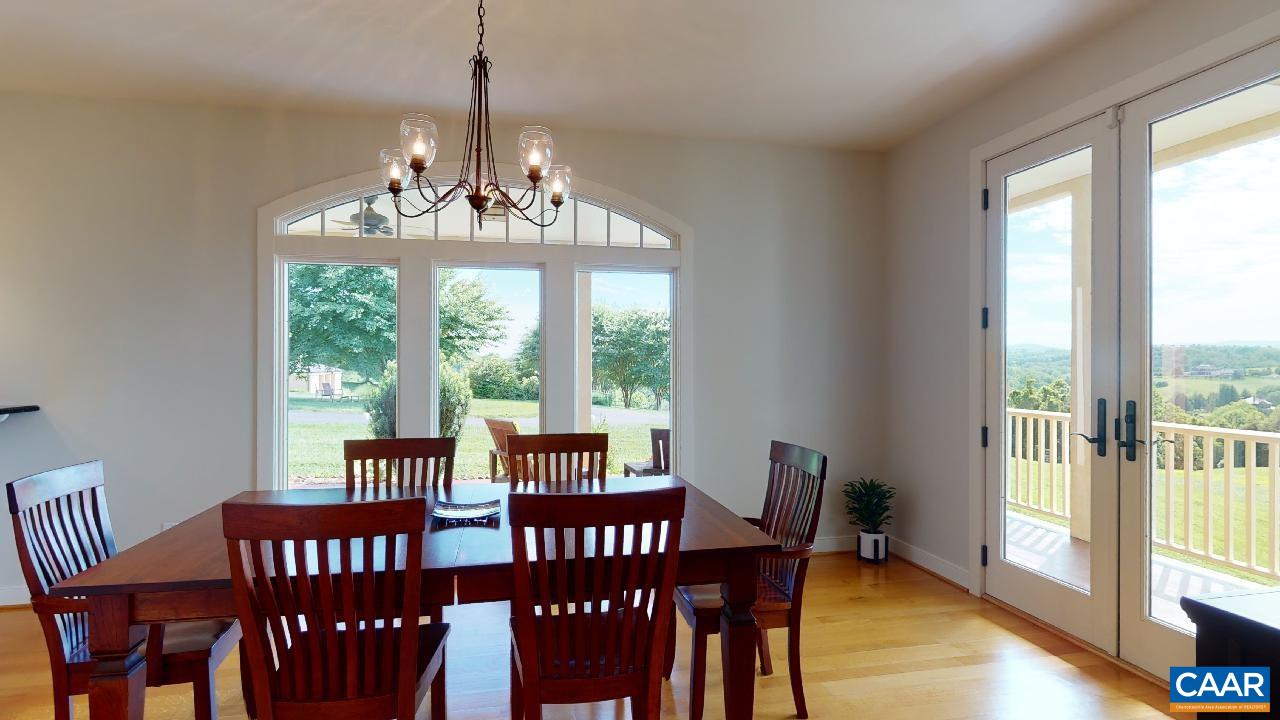 1812 Frays Mill Road Ruckersville, VA 22968 - Photo 15 of 74 a view of a dining room with furniture window and outside view