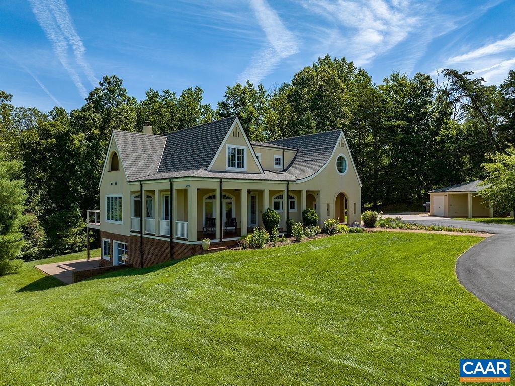 1812 Frays Mill Road Ruckersville, VA 22968 - Photo 2 of 74 a front view of house with yard outdoor seating and green space