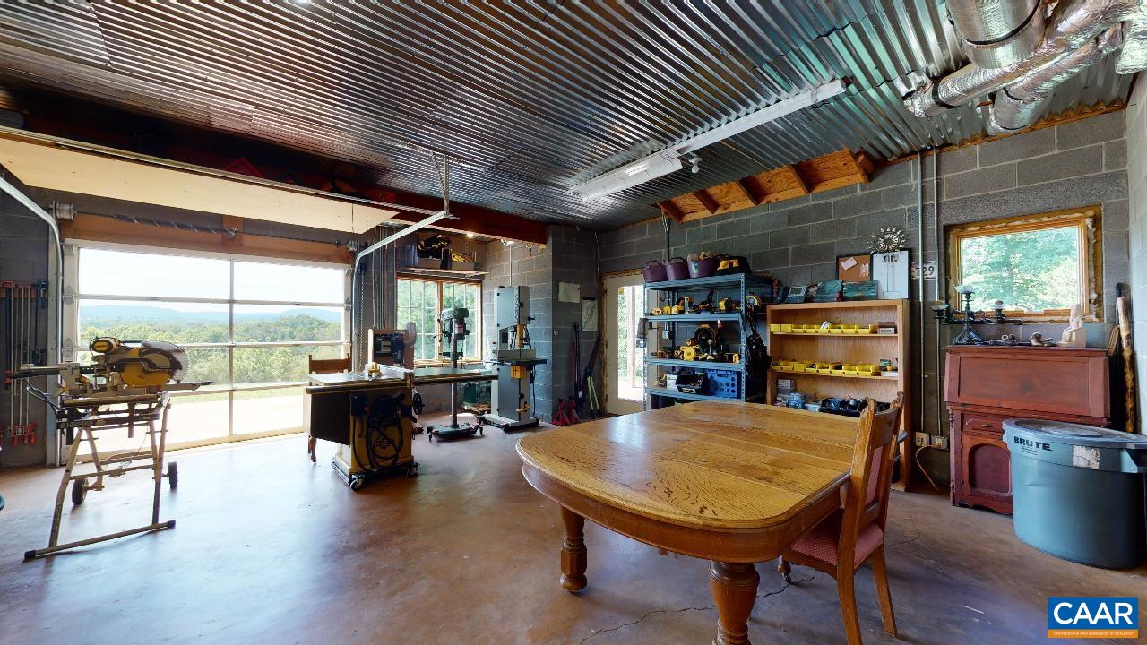 1812 Frays Mill Road Ruckersville, VA 22968 - Photo 40 of 74 a view of a dining room with furniture window and outside view
