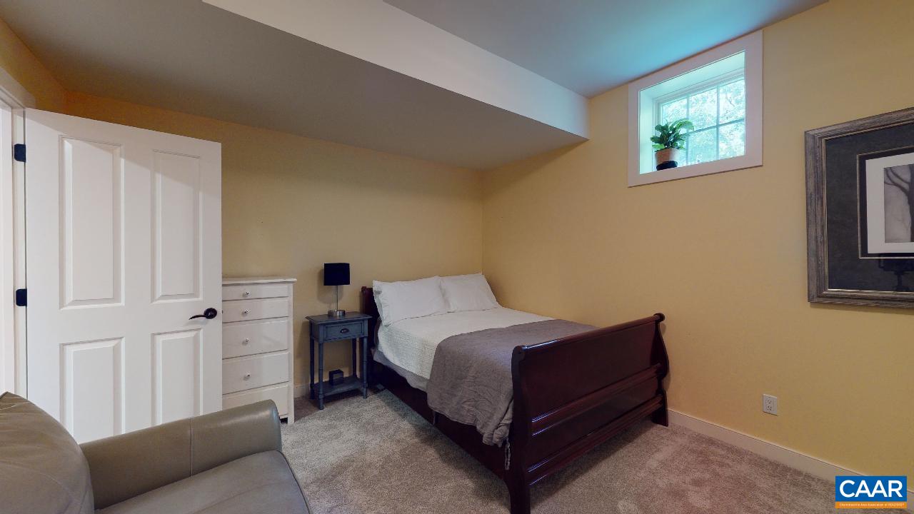 1812 Frays Mill Road Ruckersville, VA 22968 - Photo 42 of 74 a room with a bed and a window