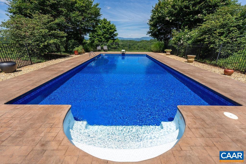 1812 Frays Mill Road Ruckersville, VA 22968 - Photo 50 of 74 a view of swimming pool with a sitting space