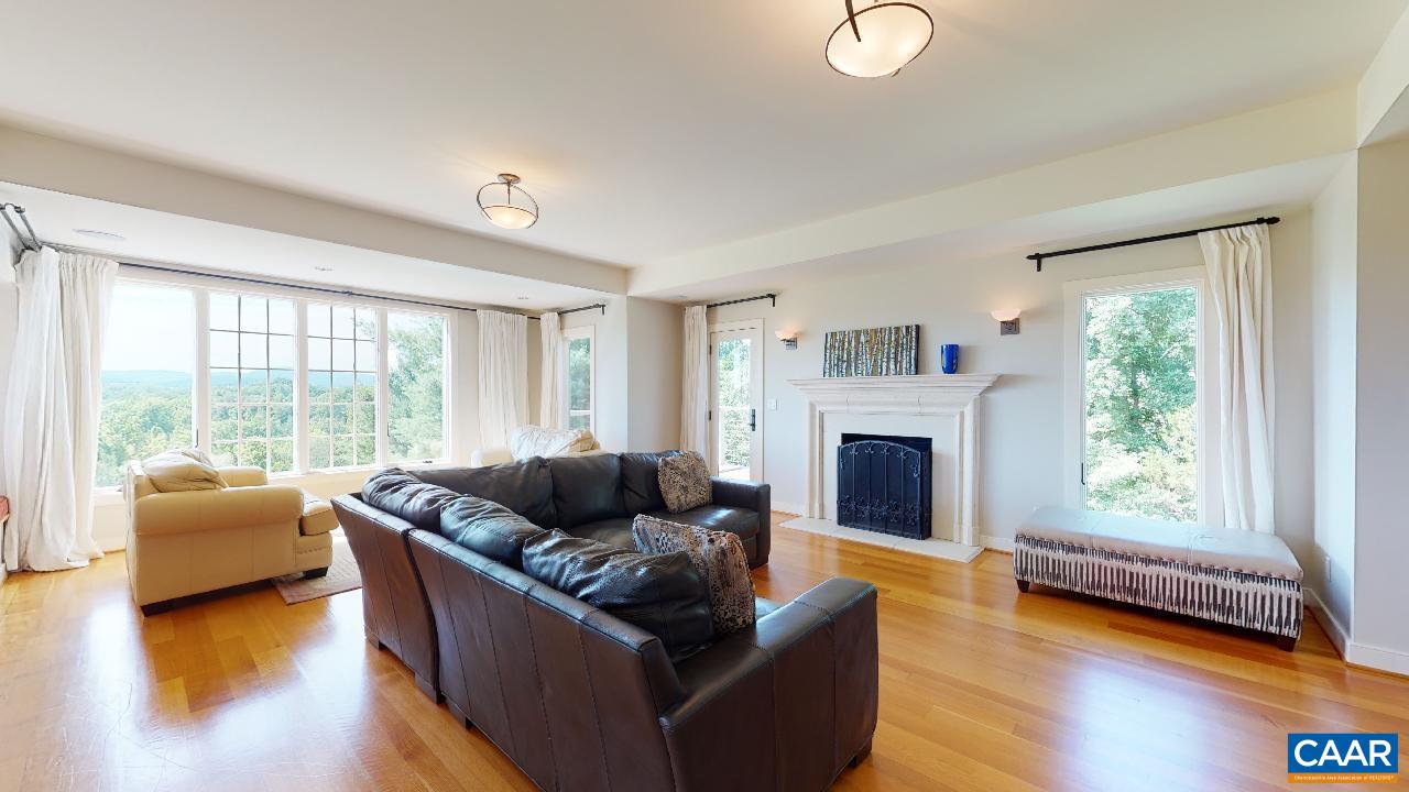 1812 Frays Mill Road Ruckersville, VA 22968 - Photo 5 of 74 a living room with furniture and a fireplace