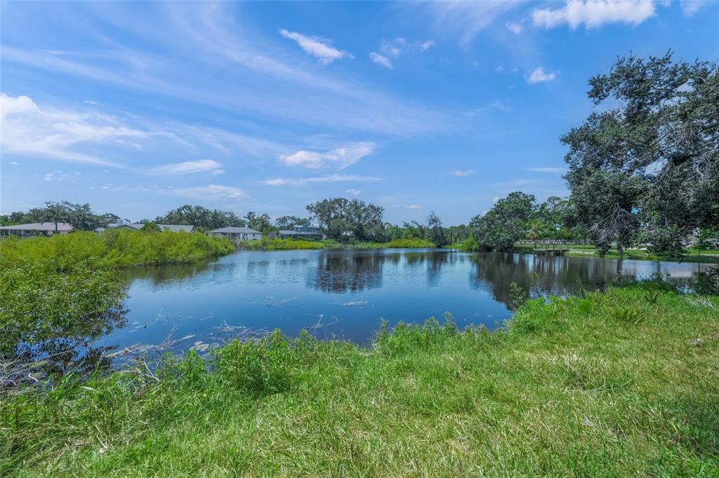 3020 Gypsy Street Sarasota, FL 34231 - Photo 33 of 34 a view of lake with green space