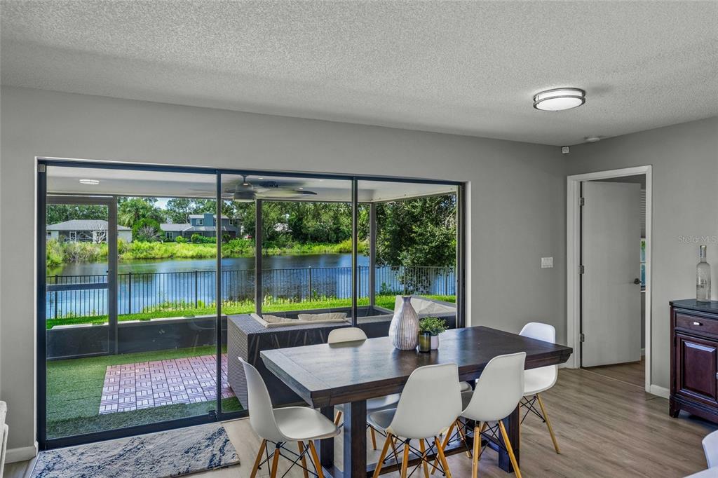 3020 Gypsy Street Sarasota, FL 34231 - Photo 10 of 34 a view of a dining room with furniture window and outside view