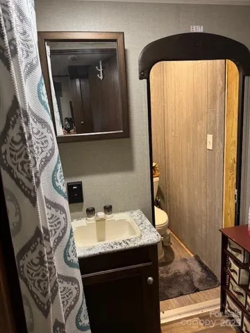 a view of a white house with a white door