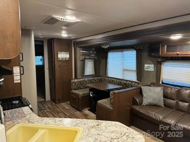 a bedroom with a bed and a mirror