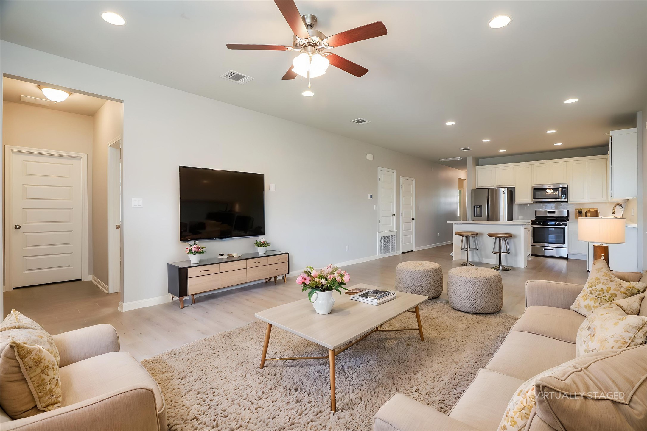 2724 Juniper Woods Road Leander, TX 78641 - Photo 2 of 21 An inviting open-concept living space integrates a well-appointed kitchen, ideal for modern entertaining.