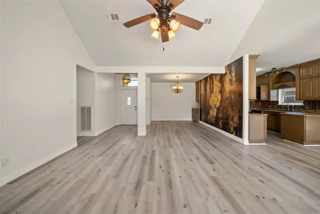 a view of a livingroom with wooden floor